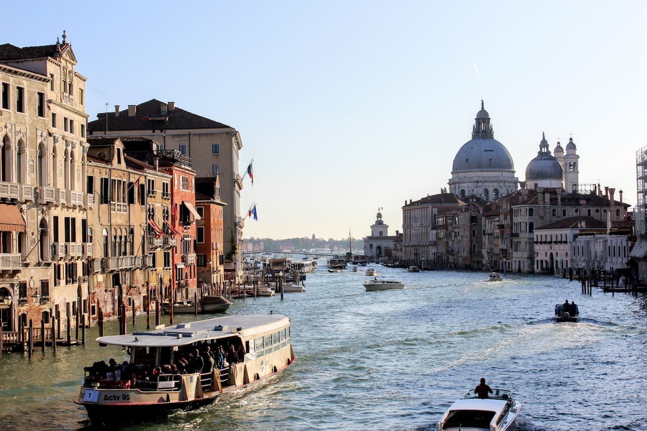 Large canal lined with multi-story buildings.