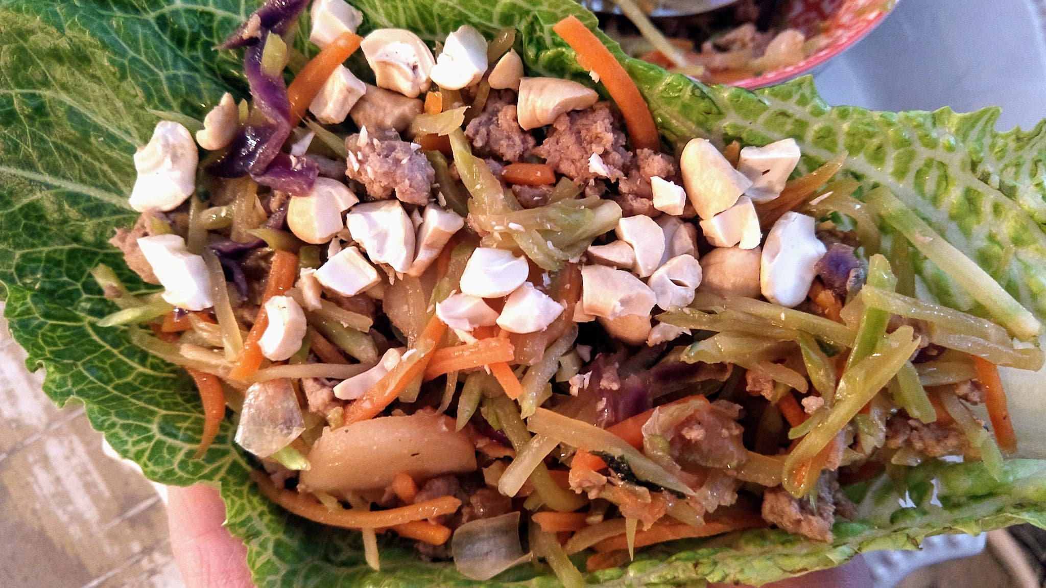 lettuce leaf filled with cooked mixture